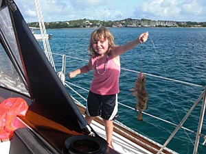 Madison catches a red hind fish!