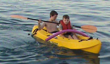 Two boys go kayaking